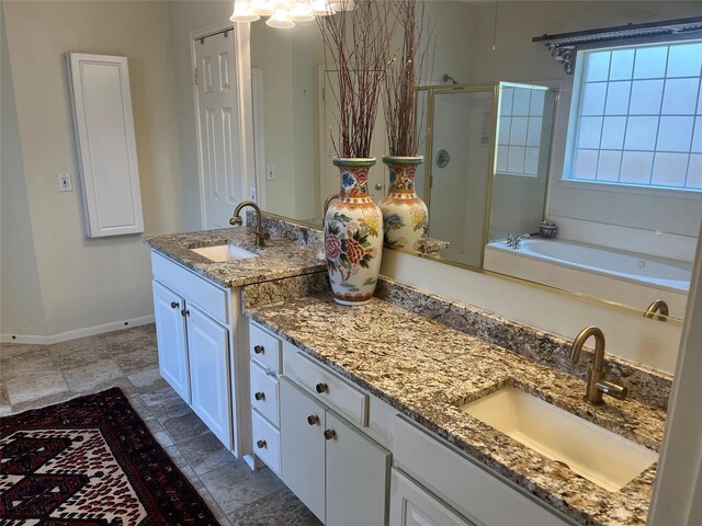 2103 Crescent Coral Dr, League City, TX 77573 - full bathroom featuring a shower stall, baseboards, vanity, and a garden tub