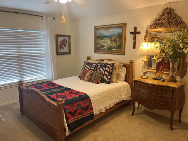 2103 Crescent Coral Dr, League City, TX 77573 - bedroom featuring carpet flooring, baseboards, and ceiling fan
