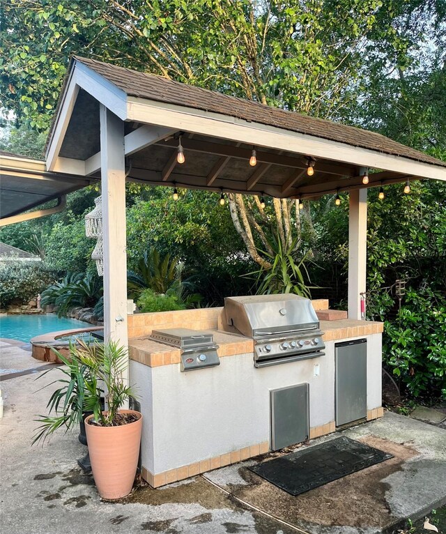 2103 Crescent Coral Dr, League City, TX 77573 - view of patio / terrace featuring a gazebo