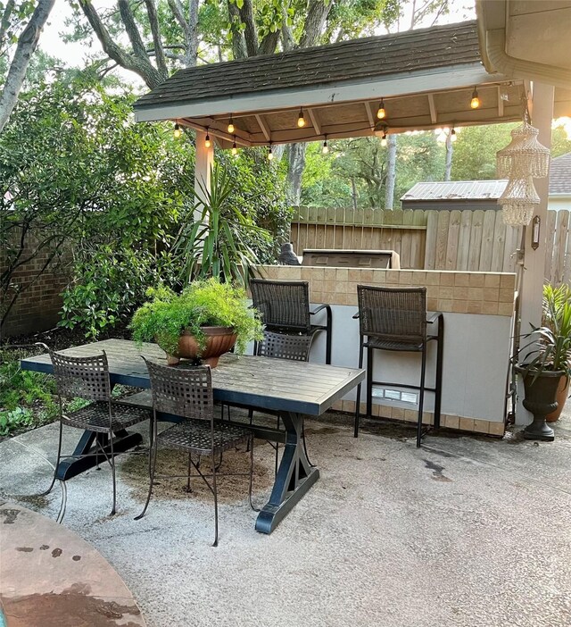 2103 Crescent Coral Dr, League City, TX 77573 - view of patio featuring exterior kitchen