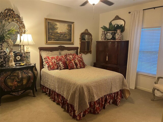 2103 Crescent Coral Dr, League City, TX 77573 - bedroom featuring carpet floors, baseboards, and ceiling fan