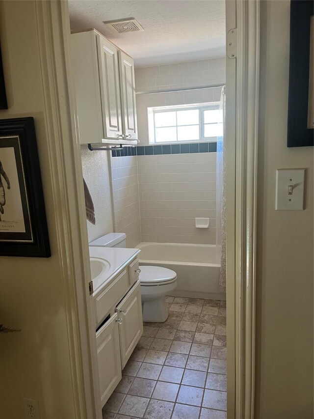 2103 Crescent Coral Dr, League City, TX 77573 - full bath with vanity, toilet, and washtub / shower combination