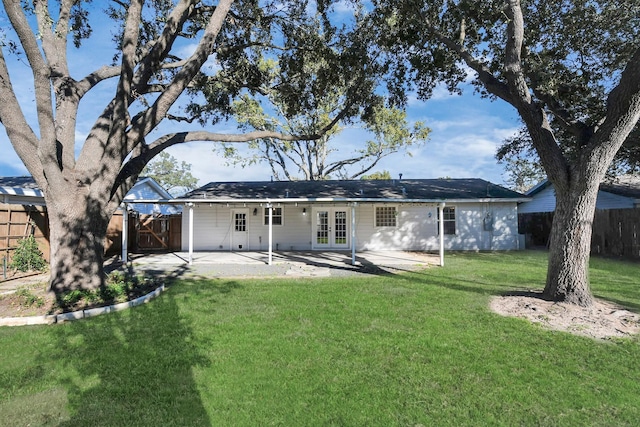 2606 Droxford Dr, Houston, TX 77008 - rear view of house with french doors, a patio, and a gate
