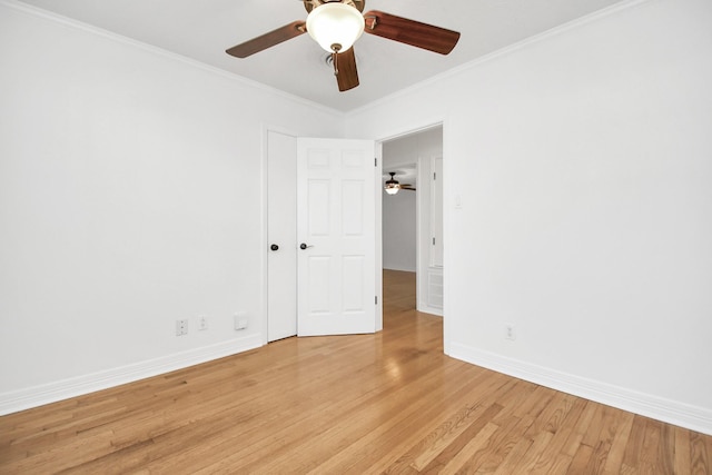 2606 Droxford Dr, Houston, TX 77008 - empty room with light wood finished floors, baseboards, a ceiling fan, and ornamental molding
