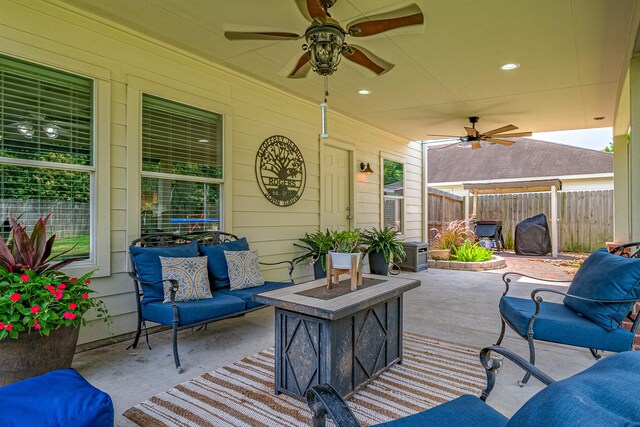 2023 Briar Grove Dr, Conroe, TX 77301 - view of patio / terrace featuring fence, ceiling fan, and outdoor lounge area