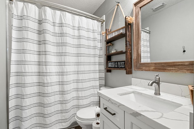 2023 Briar Grove Dr, Conroe, TX 77301 - bathroom featuring a textured ceiling, toilet, vanity, and a shower with shower curtain