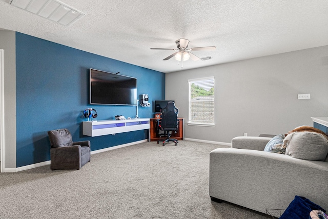 2023 Briar Grove Dr, Conroe, TX 77301 - carpeted office featuring a ceiling fan, baseboards, and a textured ceiling