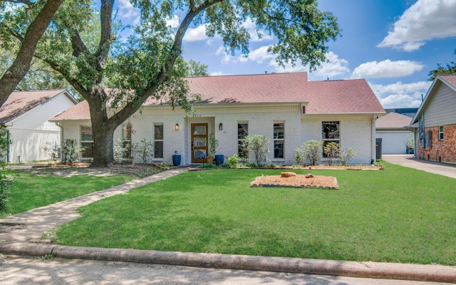 2514 Palo Pinto Dr, Houston, TX 77080 - view of front facade with brick siding and a front lawn