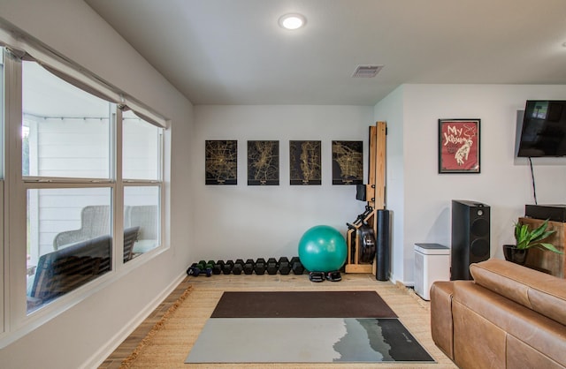 2514 Palo Pinto Dr, Houston, TX 77080 - workout room with light wood-type flooring and baseboards