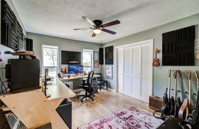 2514 Palo Pinto Dr, Houston, TX 77080 - office space with ceiling fan, wood finished floors, a textured ceiling, and baseboards
