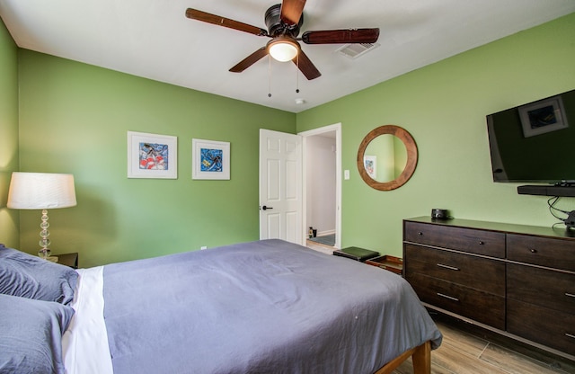 2514 Palo Pinto Dr, Houston, TX 77080 - bedroom with light wood-style flooring and a ceiling fan