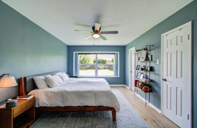 2514 Palo Pinto Dr, Houston, TX 77080 - bedroom featuring wood finished floors, baseboards, and a ceiling fan