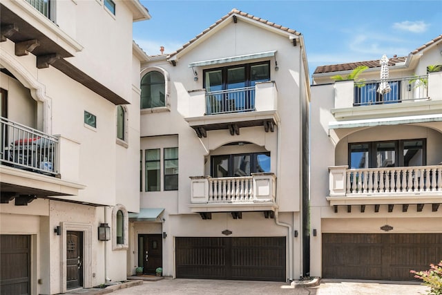 4404 Dickson St Unit B, Houston, TX 77007 - view of building exterior featuring an attached garage