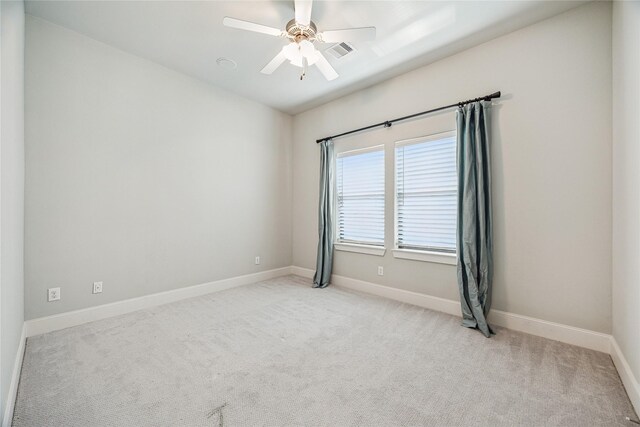 4404 Dickson St Unit B, Houston, TX 77007 - empty room with light colored carpet, baseboards, and ceiling fan