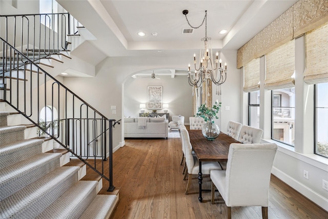 4404 Dickson St Unit B, Houston, TX 77007 - dining space featuring plenty of natural light, a ceiling fan, a chandelier, stairway, and recessed lighting