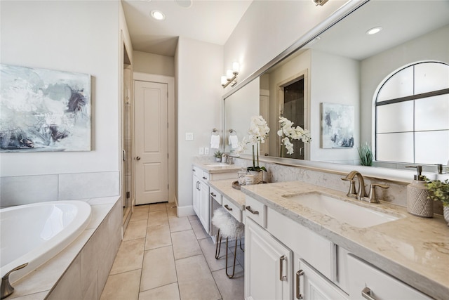 4404 Dickson St Unit B, Houston, TX 77007 - full bath with a garden tub, double vanity, tile patterned floors, and recessed lighting