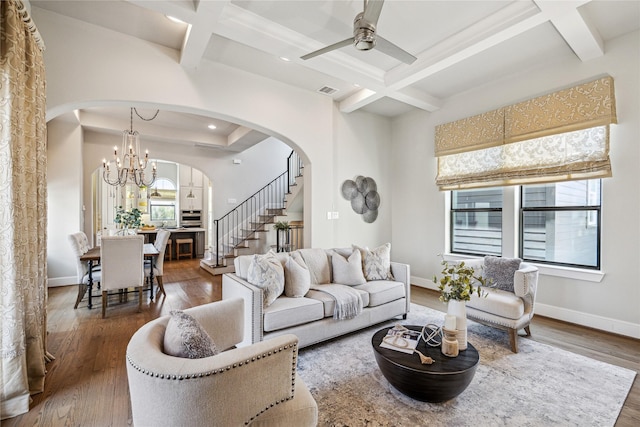 4404 Dickson St Unit B, Houston, TX 77007 - living room featuring coffered ceiling, healthy amount of natural light, arched walkways, beamed ceiling, and a ceiling fan