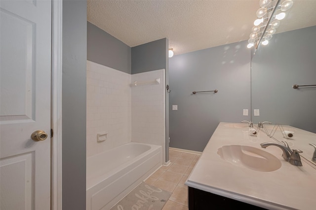 9911 Villa Verde Dr, Houston, TX 77064 - full bath with tile patterned flooring, shower / washtub combination, double vanity, a textured ceiling, and baseboards