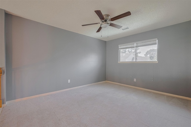9911 Villa Verde Dr, Houston, TX 77064 - unfurnished room with light carpet, a textured ceiling, a ceiling fan, and baseboards