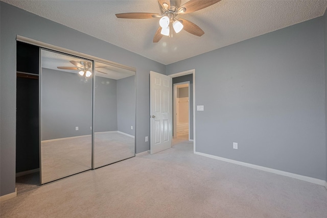 9911 Villa Verde Dr, Houston, TX 77064 - unfurnished bedroom featuring carpet, baseboards, a textured ceiling, and ceiling fan
