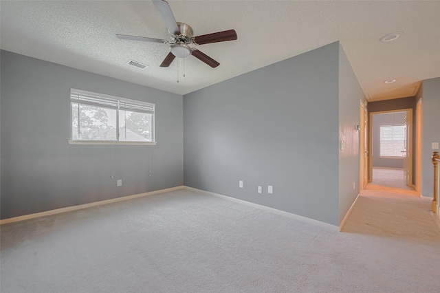 9911 Villa Verde Dr, Houston, TX 77064 - carpeted empty room featuring ceiling fan, baseboards, and a textured ceiling
