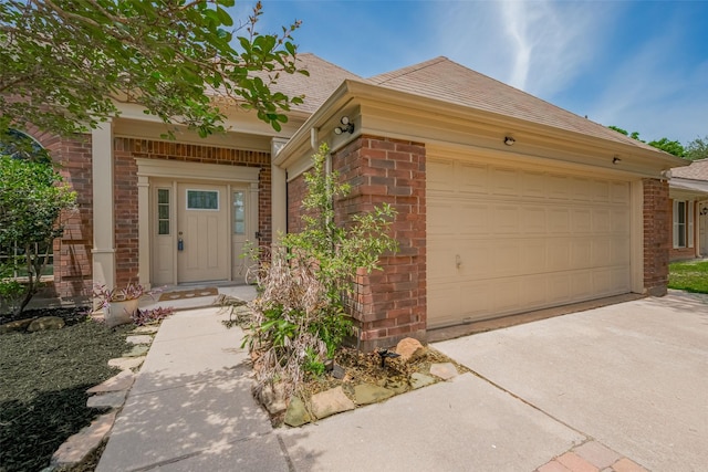 9911 Villa Verde Dr, Houston, TX 77064 - view of front of property featuring brick siding, roof with shingles, a garage, and driveway