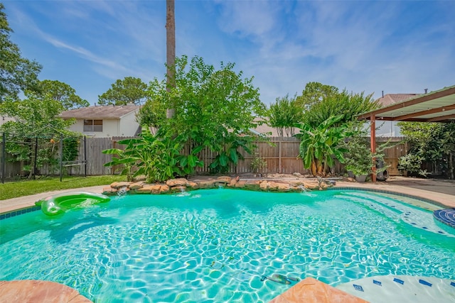 9911 Villa Verde Dr, Houston, TX 77064 - view of swimming pool with a fenced backyard
