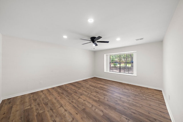 52 S High Oaks Cir, The Woodlands, TX 77380 - spare room featuring dark wood-style floors, recessed lighting, baseboards, and a ceiling fan