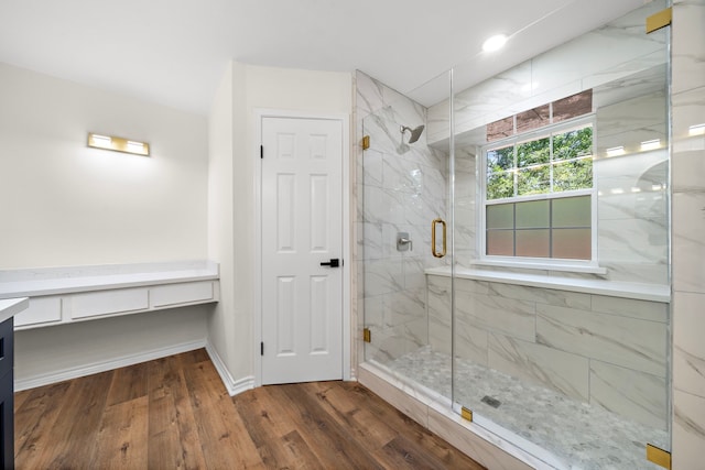 52 S High Oaks Cir, The Woodlands, TX 77380 - full bath with a marble finish shower, wood finished floors, vanity, and baseboards