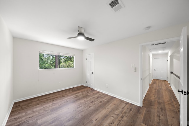 52 S High Oaks Cir, The Woodlands, TX 77380 - unfurnished room featuring attic access, ceiling fan, wood finished floors, baseboards, and a smoke detector
