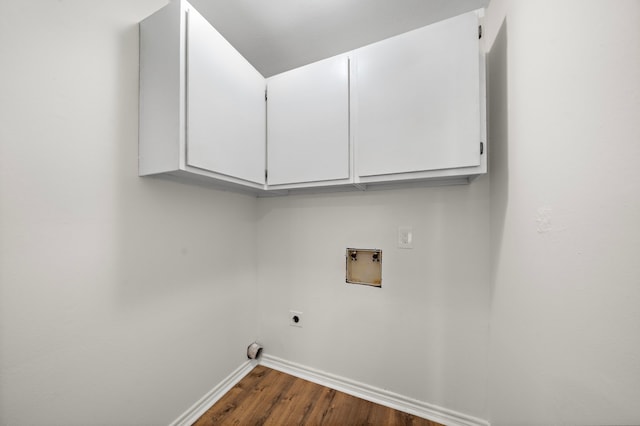 52 S High Oaks Cir, The Woodlands, TX 77380 - washroom with cabinet space, electric dryer hookup, baseboards, hookup for a washing machine, and dark wood finished floors