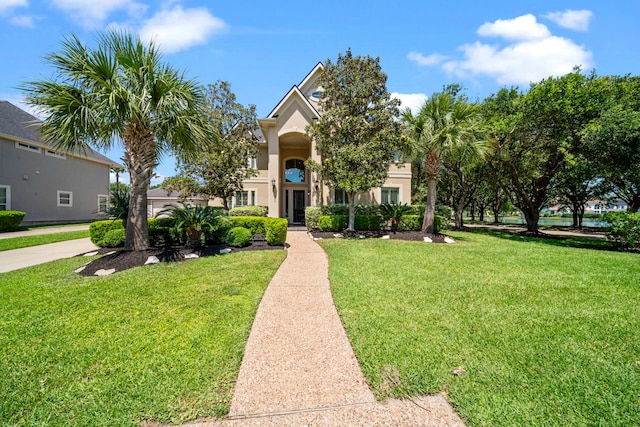 20002 Meadow Arbor Ct, Katy, TX 77450 - view of front facade featuring a front yard and stucco siding