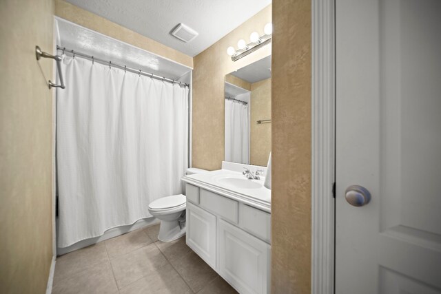 20002 Meadow Arbor Ct, Katy, TX 77450 - full bathroom with tile patterned floors, toilet, vanity, and a shower with shower curtain