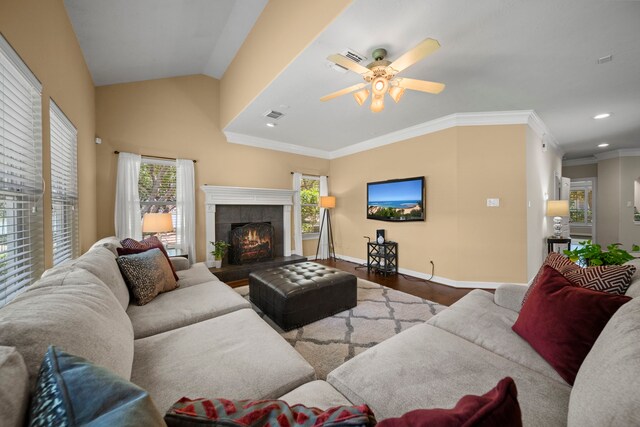 20002 Meadow Arbor Ct, Katy, TX 77450 - living room with a ceiling fan, baseboards, a tiled fireplace, wood finished floors, and recessed lighting