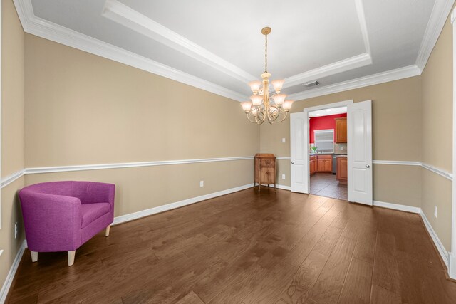 20002 Meadow Arbor Ct, Katy, TX 77450 - dining space with a chandelier, a raised ceiling, dark wood-style floors, crown molding, and baseboards