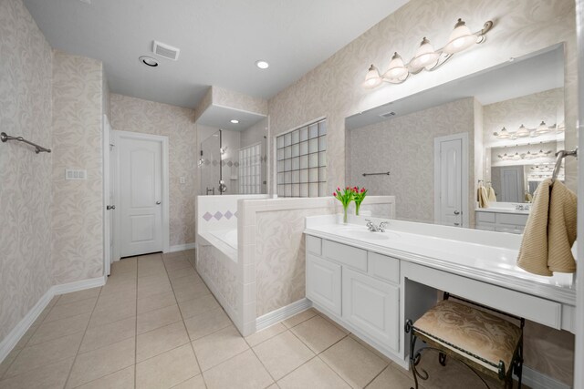 20002 Meadow Arbor Ct, Katy, TX 77450 - full bath with tile patterned floors, a bath, a tile shower, baseboards, and recessed lighting