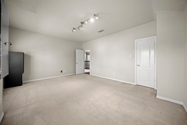 20002 Meadow Arbor Ct, Katy, TX 77450 - carpeted empty room featuring baseboards and track lighting