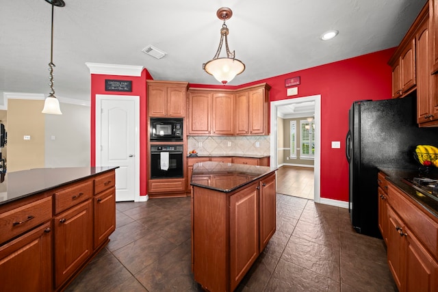 20002 Meadow Arbor Ct, Katy, TX 77450 - kitchen with black appliances, backsplash, a kitchen island, brown cabinets, and hanging light fixtures