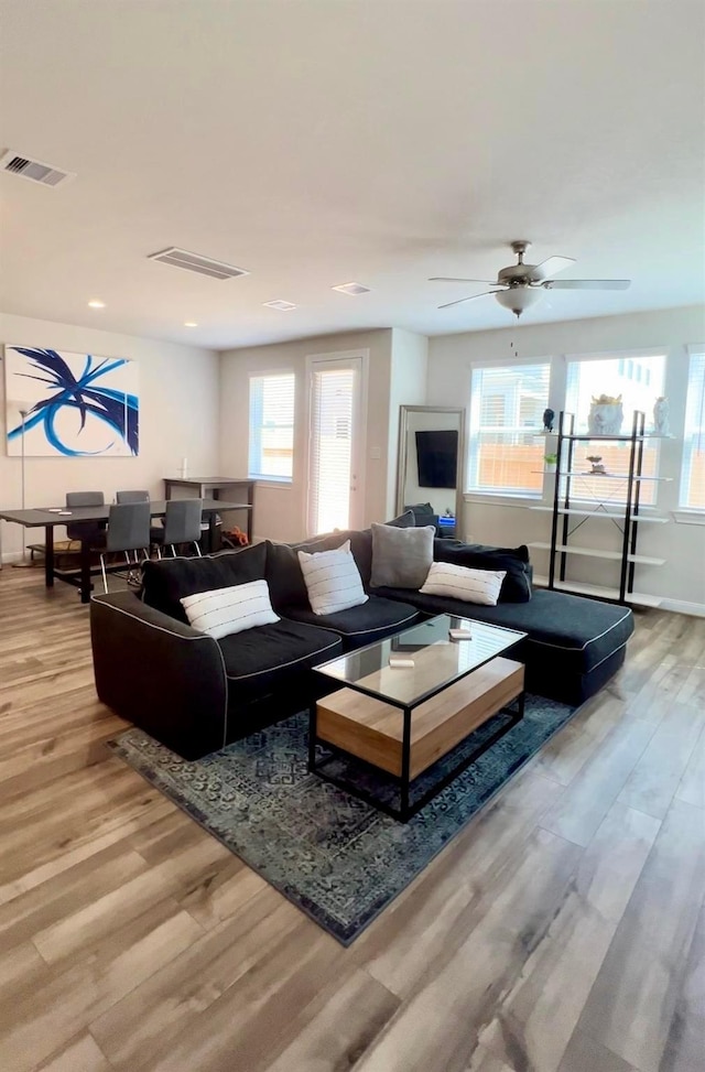 9829 Heritage Run Ln, Houston, TX 77080 - living room featuring wood finished floors, recessed lighting, ceiling fan, and baseboards