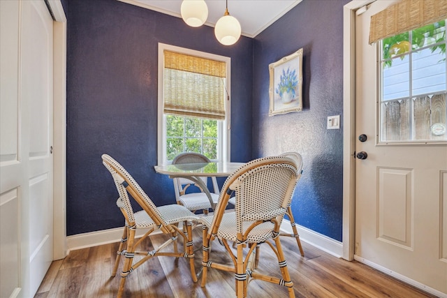 2618 Sunset Blvd, West University Place, TX 77005 - dining space with wood finished floors, baseboards, and a textured wall