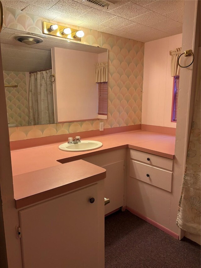 104 Crooked Creek Dr, Sheridan, TX 77475 - full bathroom with vanity and wallpapered walls