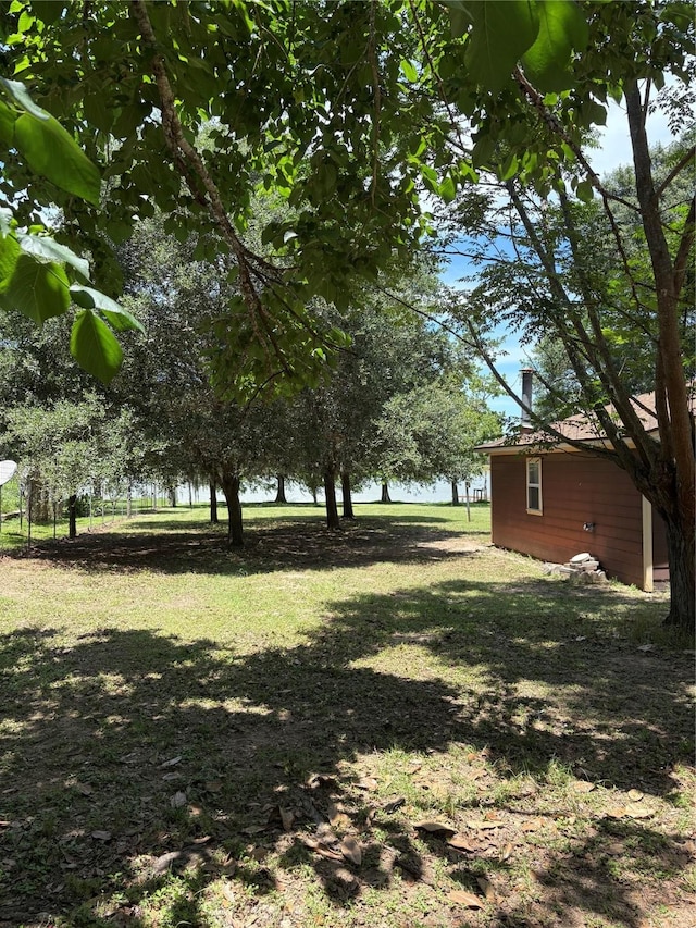 104 Crooked Creek Dr, Sheridan, TX 77475 - view of grassy yard