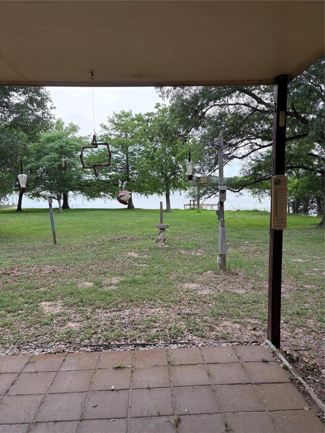 104 Crooked Creek Dr, Sheridan, TX 77475 - view of grassy yard with a water view