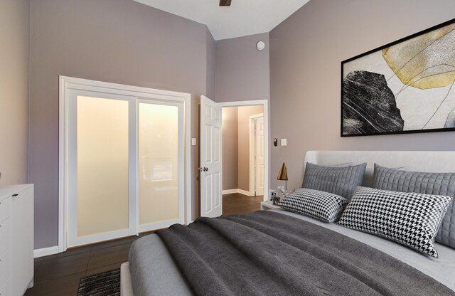 14834 Plantation Oak Dr, Houston, TX 77068 - bedroom with baseboards and lofted ceiling