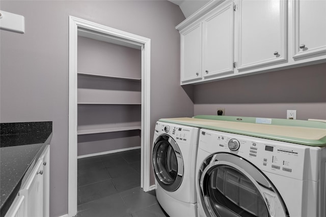 14834 Plantation Oak Dr, Houston, TX 77068 - laundry room with washer and clothes dryer, cabinet space, and dark tile patterned floors