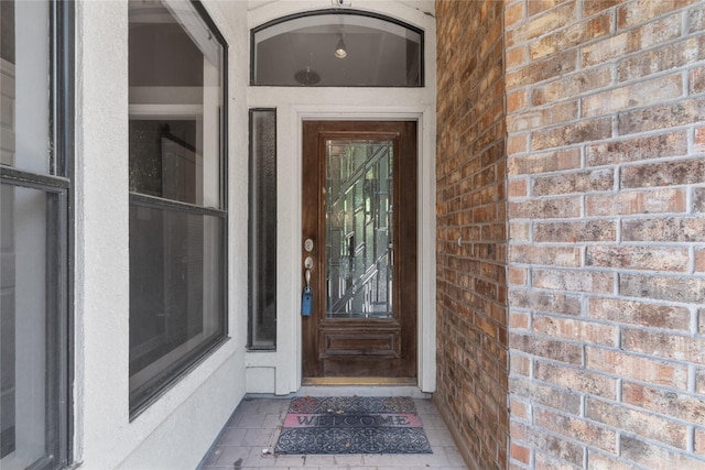 14834 Plantation Oak Dr, Houston, TX 77068 - view of exterior entry featuring brick siding