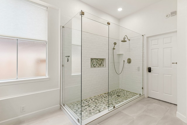 1807 Rustic Hills Ct, Sugar Land, TX 77479 - bathroom with a stall shower, plenty of natural light, baseboards, and recessed lighting