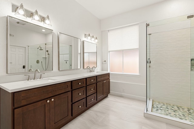 1807 Rustic Hills Ct, Sugar Land, TX 77479 - full bathroom featuring a stall shower and double vanity