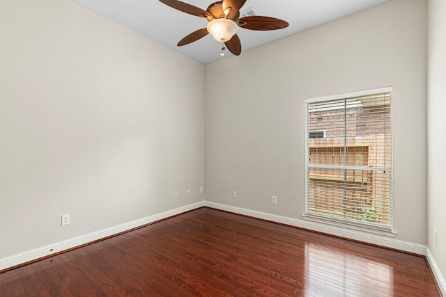 1807 Rustic Hills Ct, Sugar Land, TX 77479 - unfurnished room featuring healthy amount of natural light, baseboards, a ceiling fan, and wood finished floors