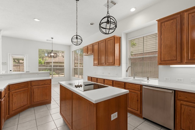 1807 Rustic Hills Ct, Sugar Land, TX 77479 - kitchen with stainless steel dishwasher, black electric cooktop, a sink, backsplash, and light tile patterned floors